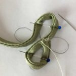 Step-by-step guide to creating a frog closure for your garments